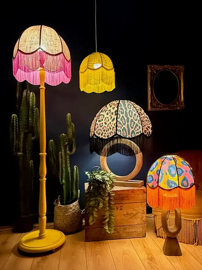 Vintage Fringed Dome Lampshade In Neon Leopard, in a room. 