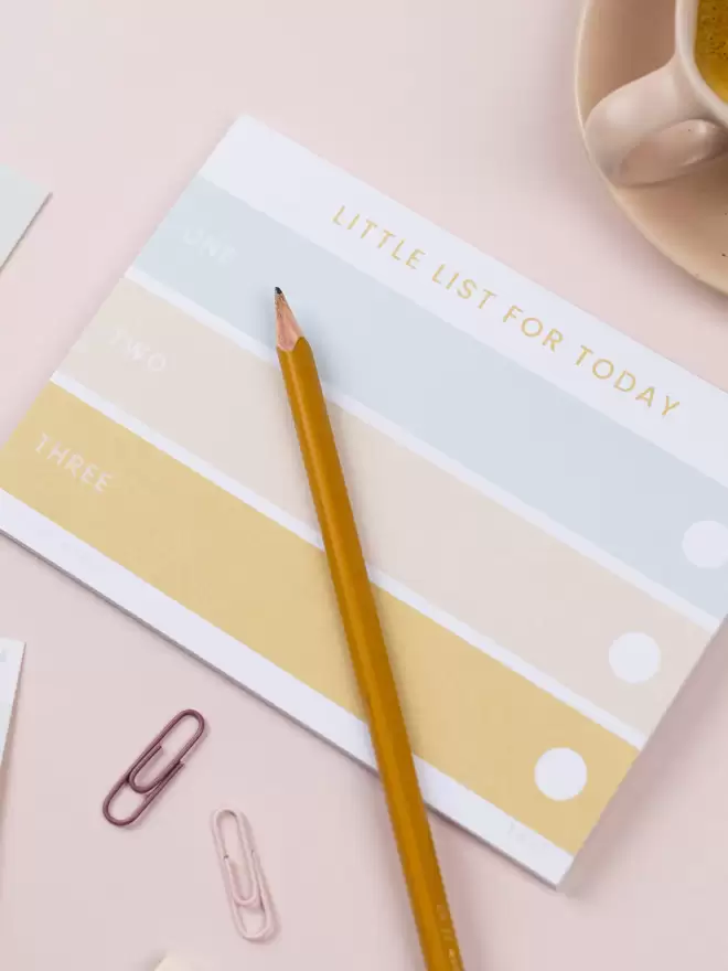 A landscape A6 notepad with 3 horizontal options in blue, pink and caramel colours. At the top it reads 'Little list for today' in capital letters