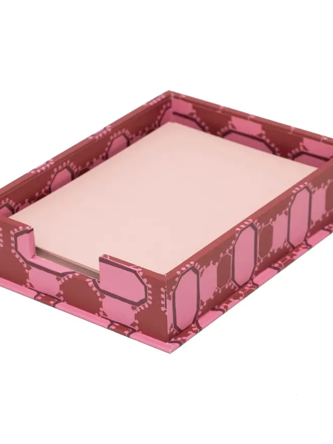 Romarong Letter Tray, a colourful and patterned tray sitting on a plain surface against a white backdrop. 