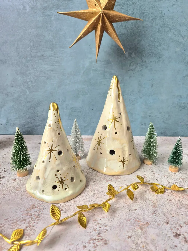 Ceramic christmas tree tea light holder, clay, pottery, Christmas decor, mantlepiece decor, christmas decoration, white with gold details, photographed with a gold star and gold leaves