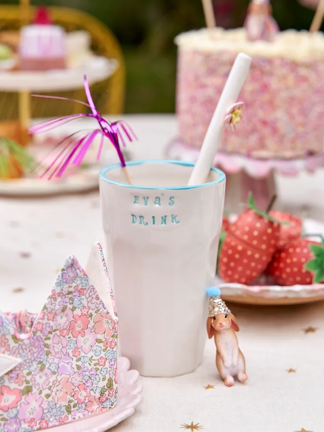 Personalised Ceramic Cup placed in a birthday set up 