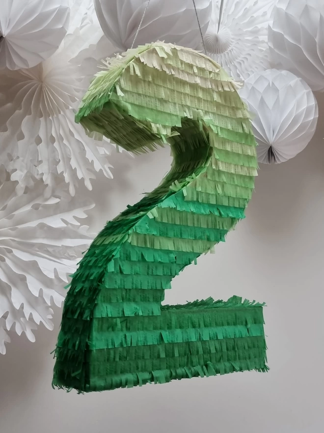 green ombre number 2 pinata by pinyatay on a white background