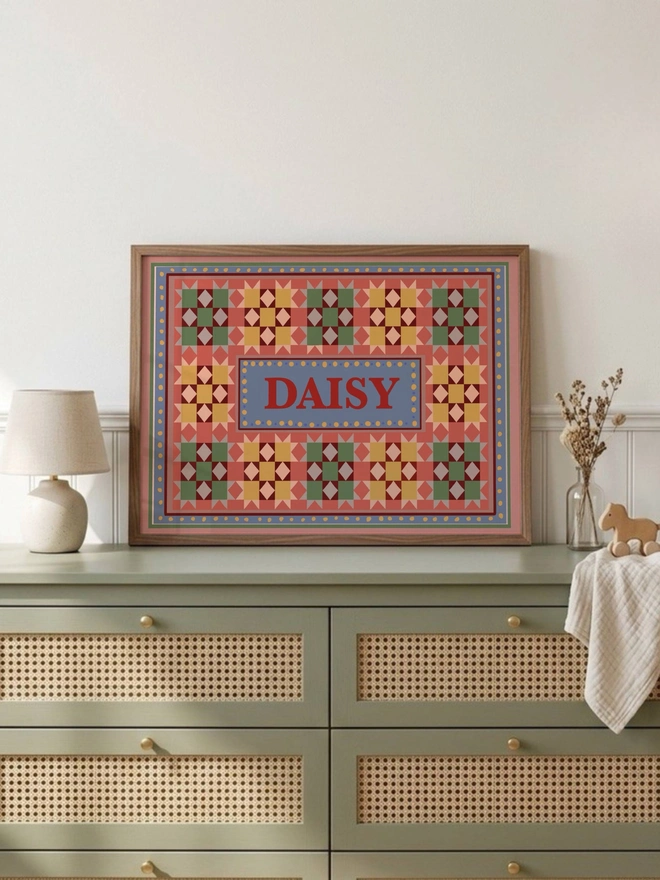 Custom name wall art featuring personalised patchwork print with a child's name taking centre stage, perfect for nursery and children's bedroom decor