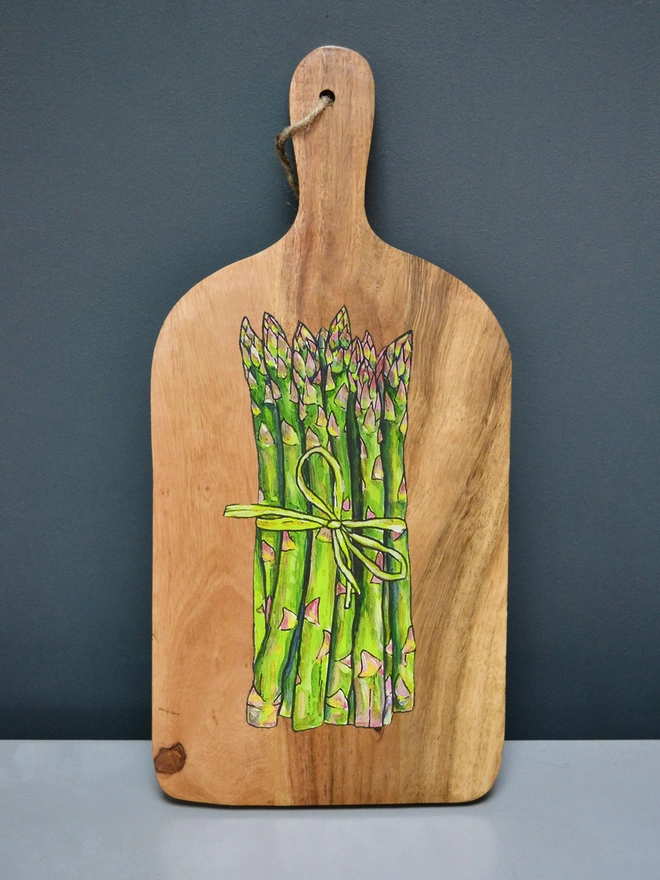 Asparagus design handpainted on wooden serving board