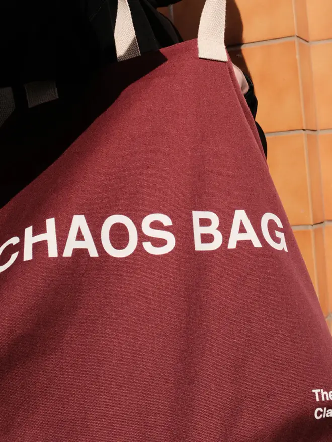 'Chaos' Tote Bag, being worn. 