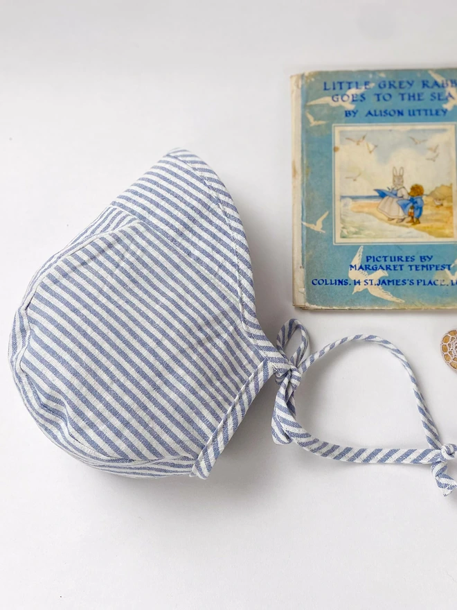 stripe bonnet for baby in the sun