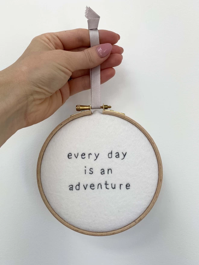 Hand holding Custom Quote Embroidery Hoop Decoration