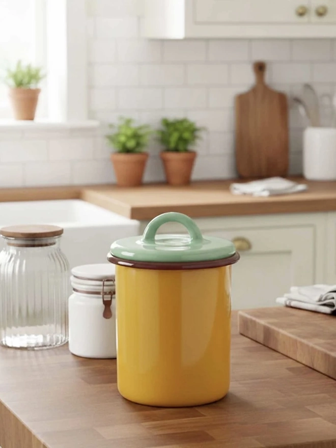 Enamel Storage Jar, a colourful enamel storage jar sitting on a kitchen counter top