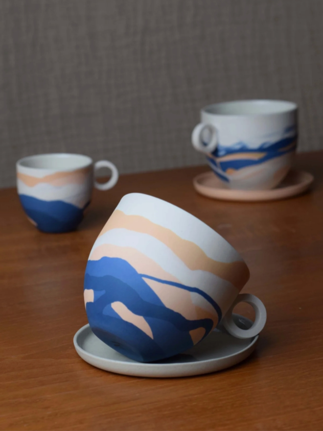 Shore Dreamlands Mug. A selection of mugs from the Shore Dreamlands collection, showing typical variation in decoration.