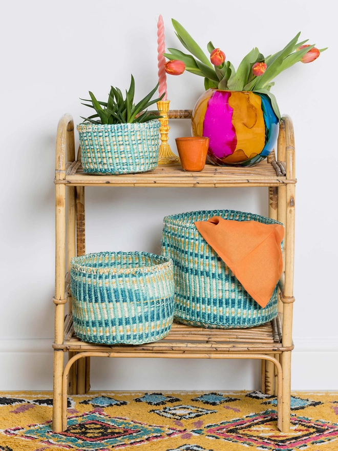 styled turquoise and gold tie dye woven sisal baskets