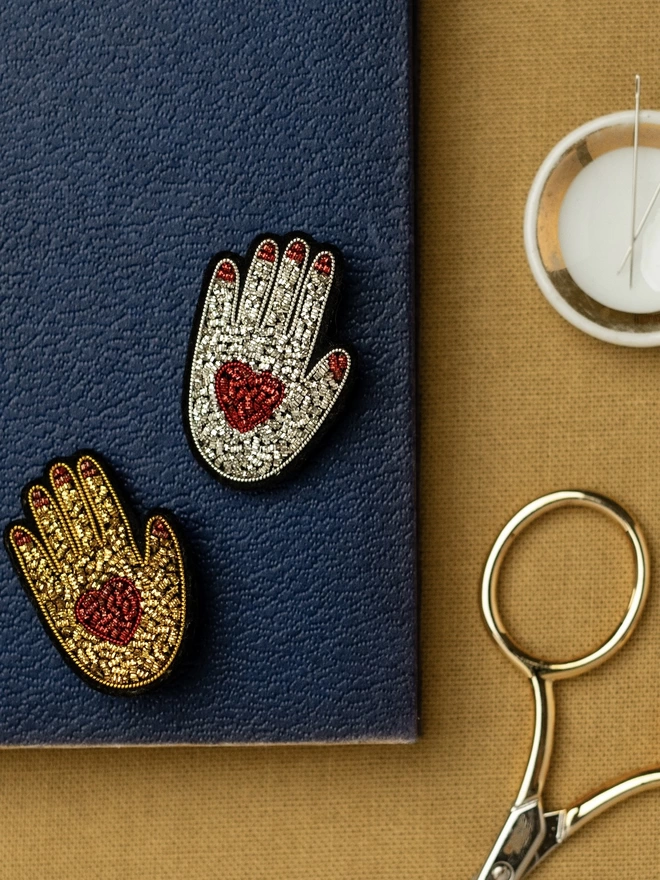 Heart in Hand Brooch - Gold & Silver