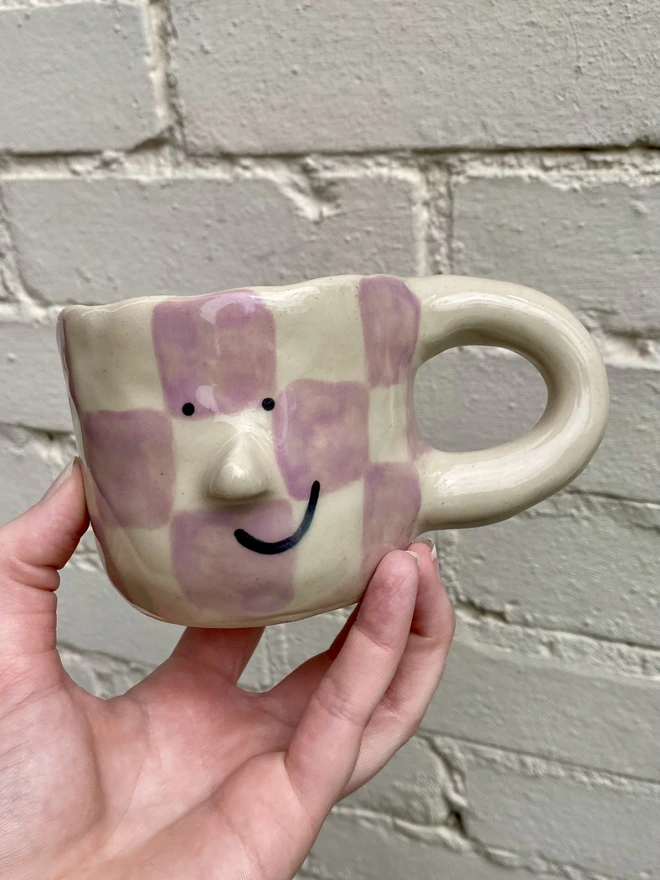 purple checkerboard mug