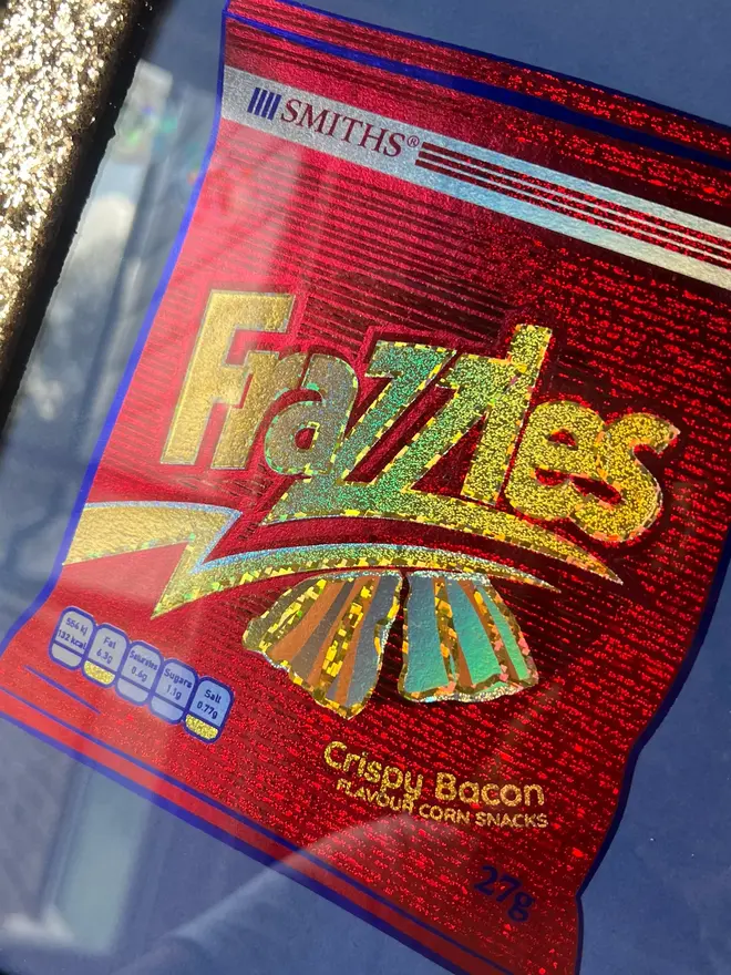 'Frazzles' ScreenPrint, a colourful frazzles screenprint, framed, held by a person. 