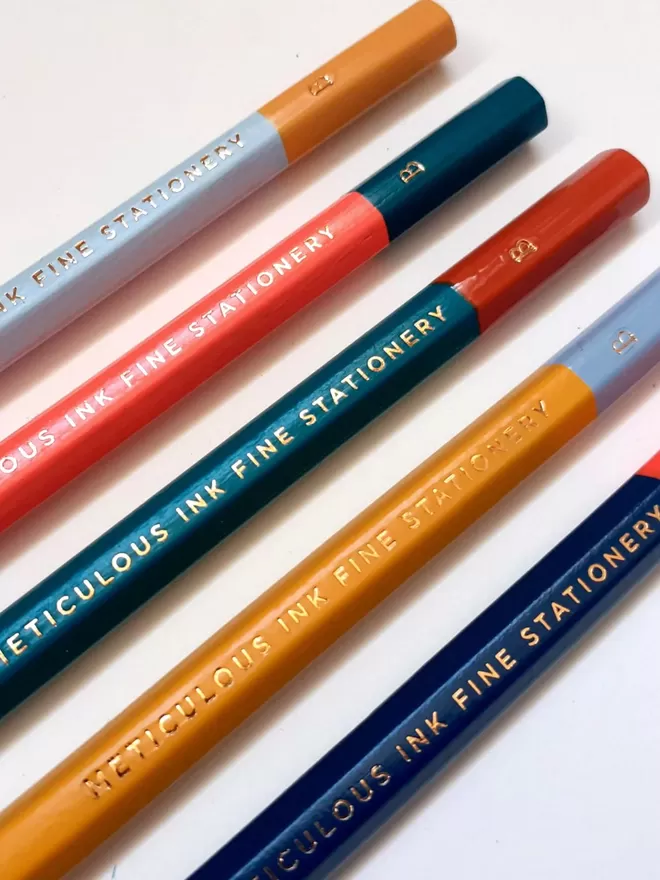 Meticulous Ink Personalised Pencils seen in different colourways with different phrases.