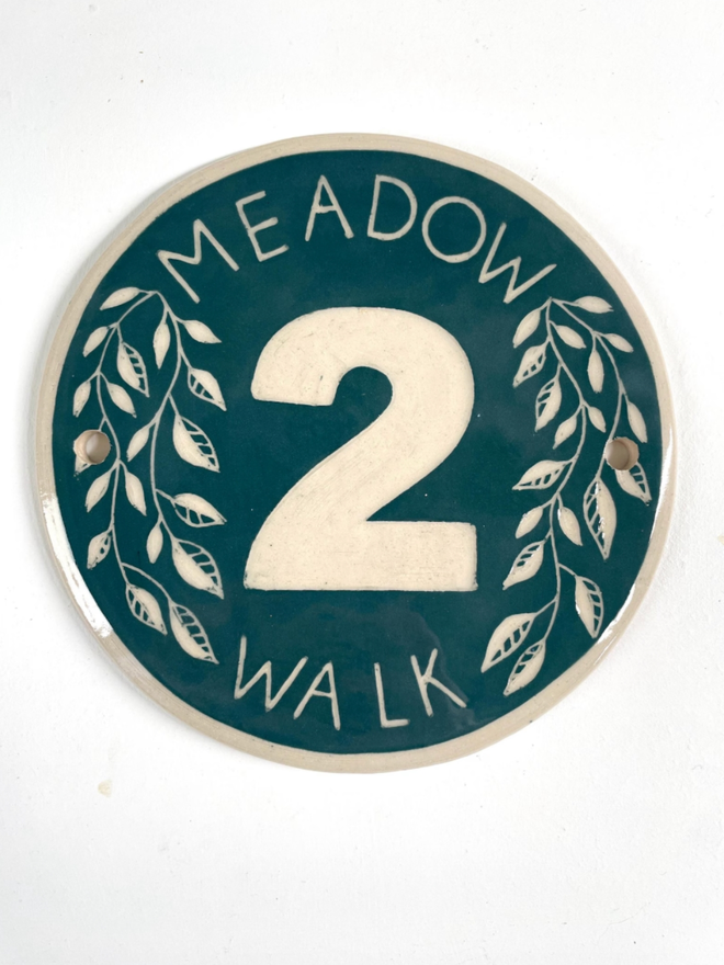 Handmade Stoneware Leaf House Number Sign. A sign in pine green.