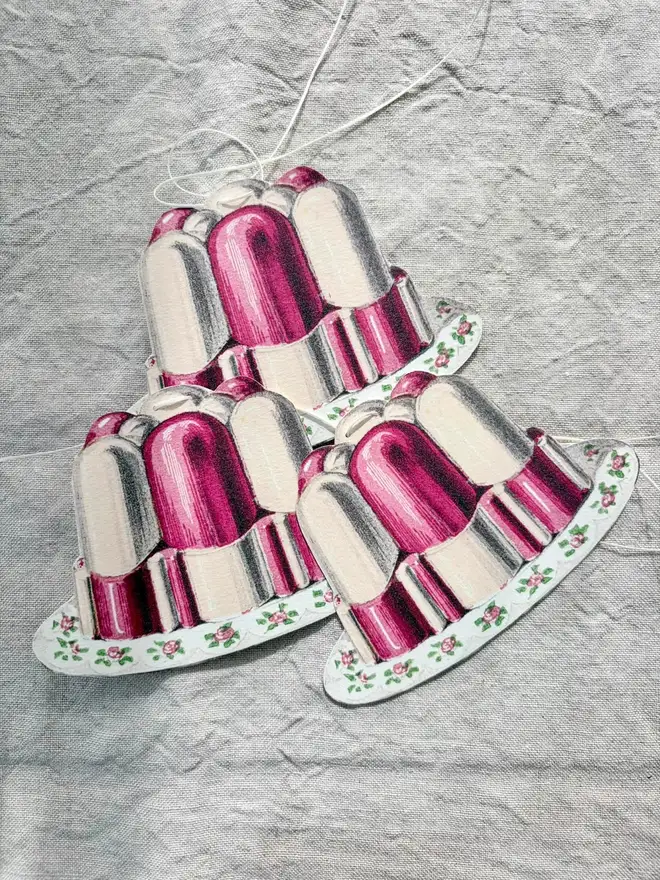 A string of pink and white jelly shaped bunting