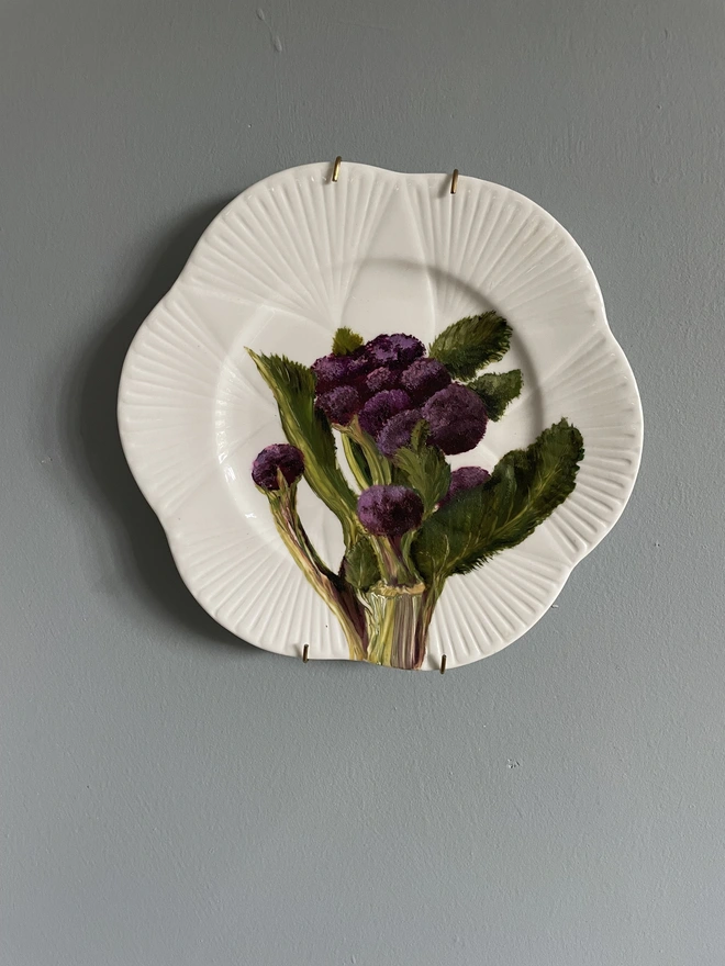 purple broccoli painting on plate