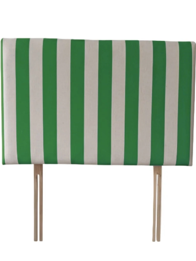 Hand Painted Upholstered Linen Headboard In Stripe Print, a moss green striped headboard sitting against a white background. 