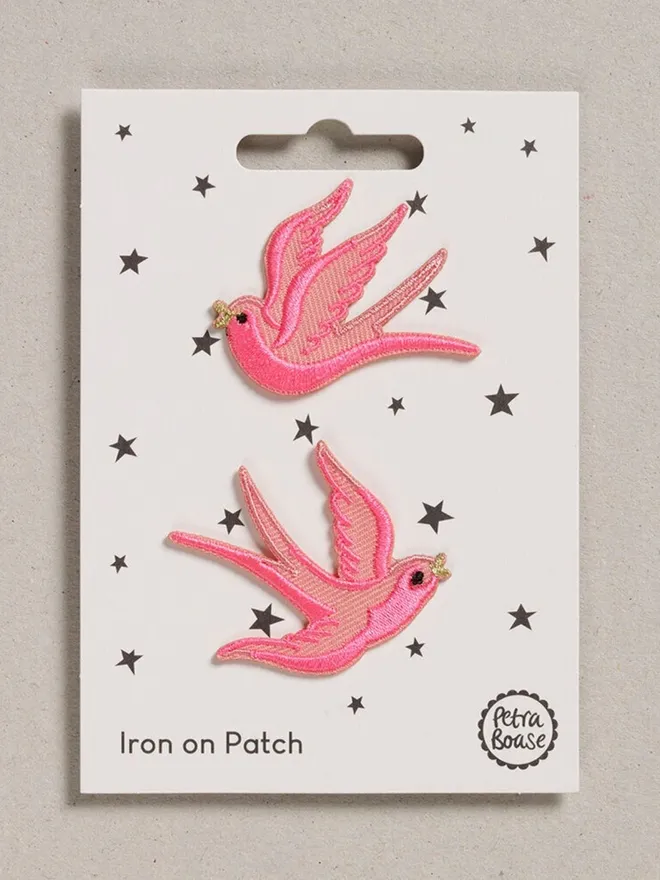 Pink swallows iron on embroidered fabric patches.
