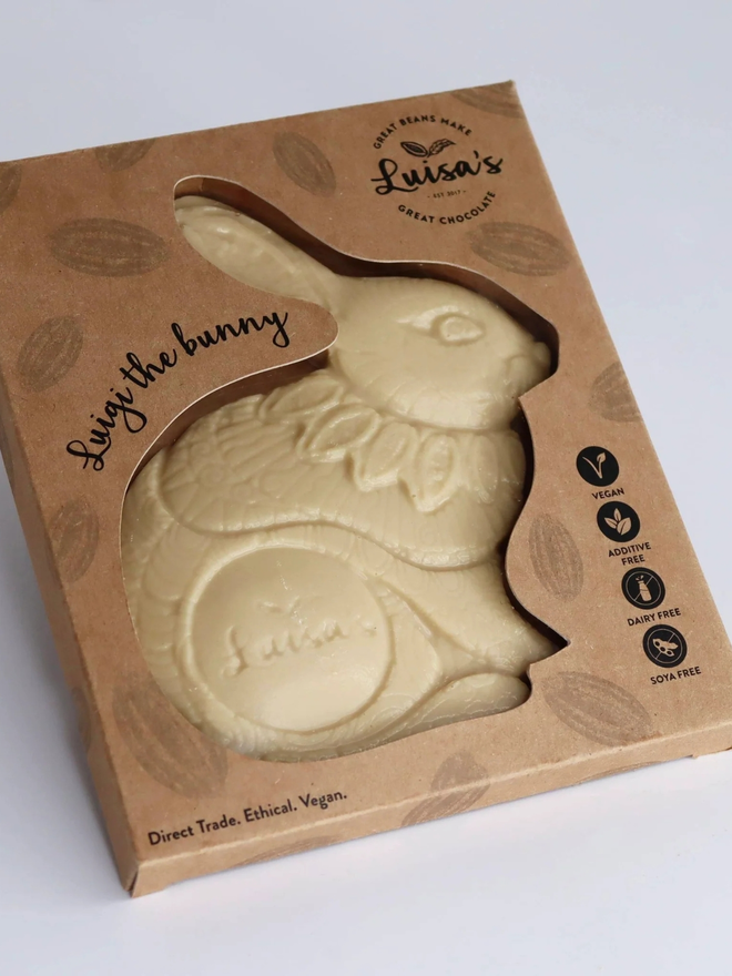 Vegan White Casholate Luigi Chocolate Bunny in a closed box showing descriptive product information