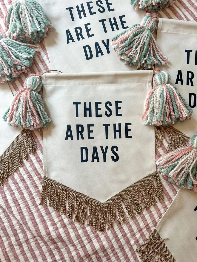 These Are The Days decorative wall hanging banner with tassels