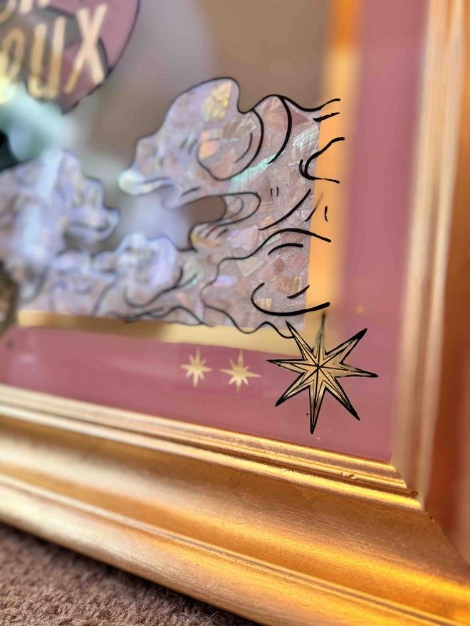 'Do Things That Make You Happy' Gold Leaf Glass Artwork, a large colourful print with a star motif sitting on a green backdrop. 