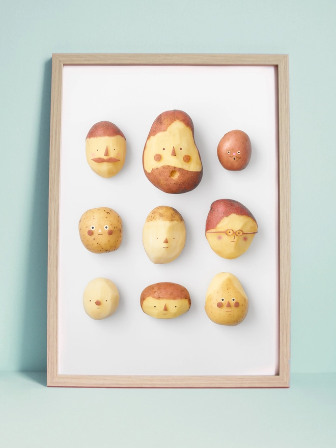 A3 art print of 9 Potatoes with faces on a white back ground 