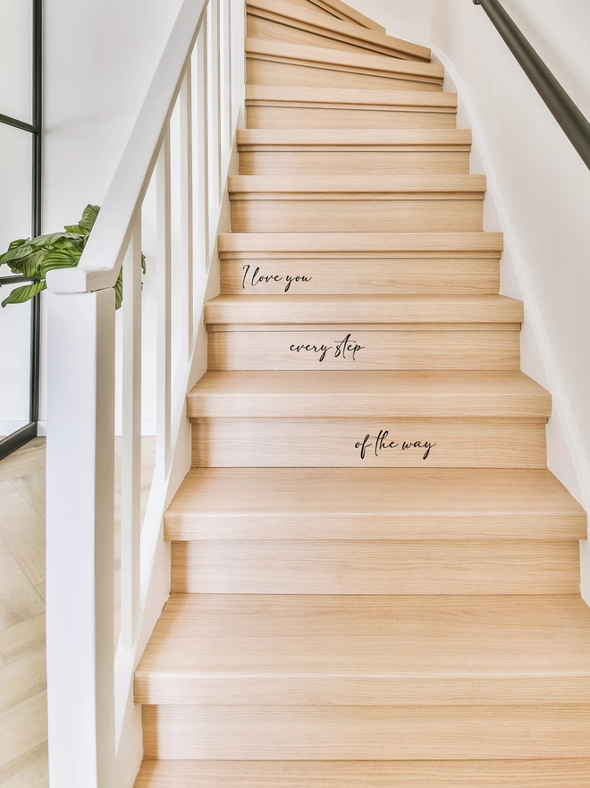 I Love You Every Step Of The Way Stair Sticker Decal on light wooden stairs