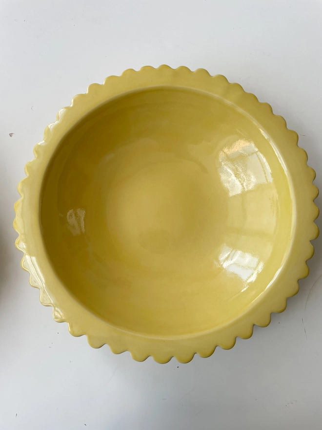 Large Yellow serving bowl with scalloped edge