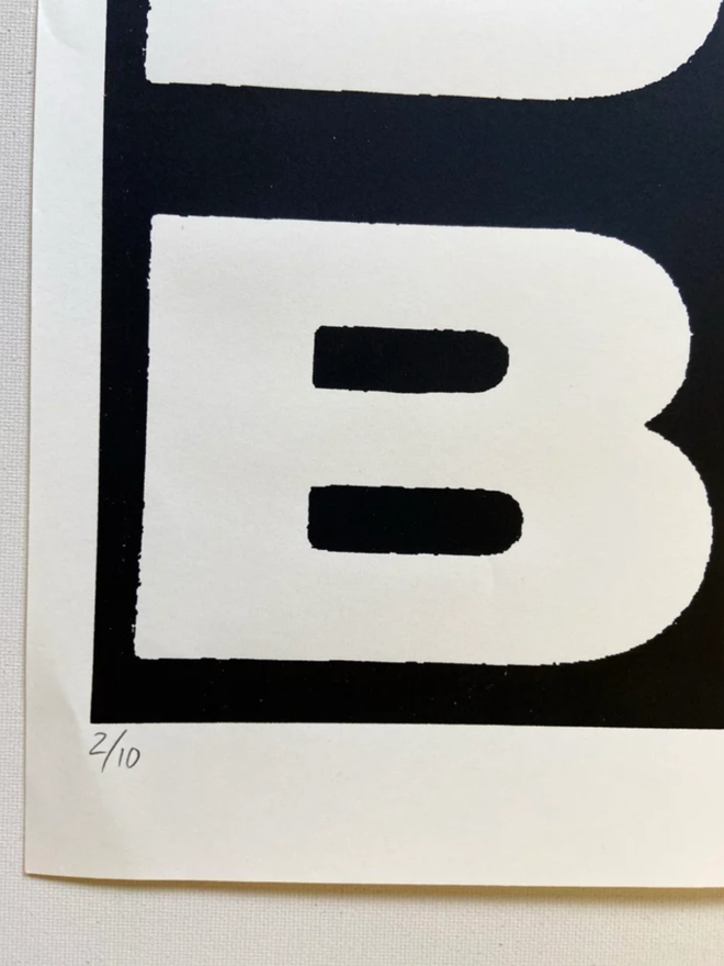Beats Print. A close up of the bottom left corner of the print with ‘2/10’ written in pencil, indicating this print is part of a limited run of 10 prints.
