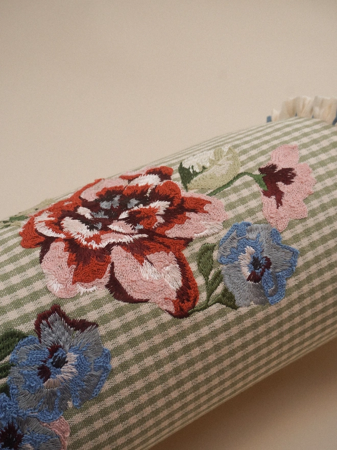 Close up of Rosa Bolster cushion