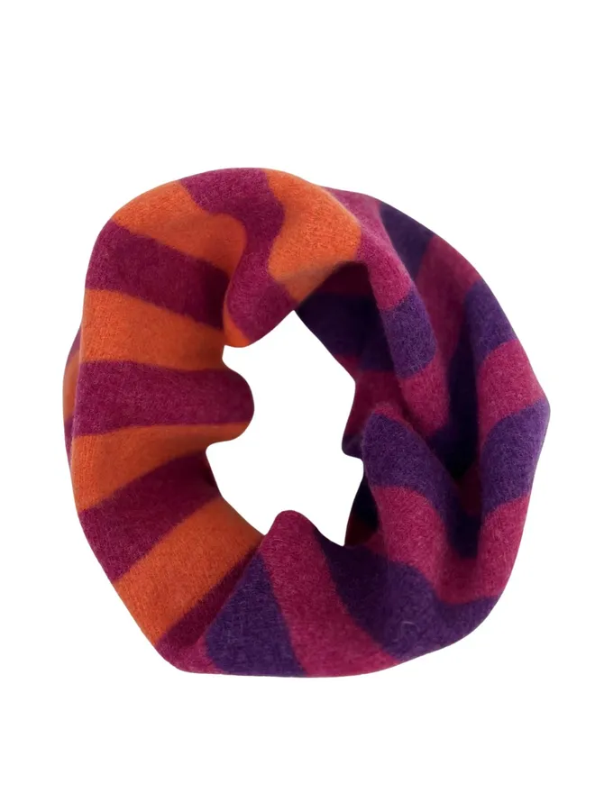 Merino wool snood in purple orange magenta shown on a white background.