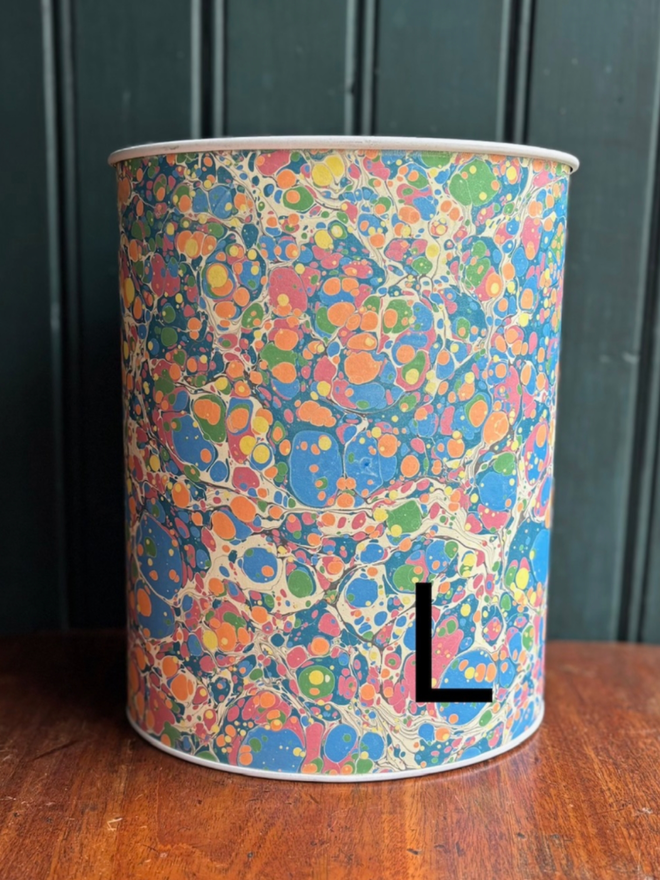 Oval Waste Paper Bin. A bin in L