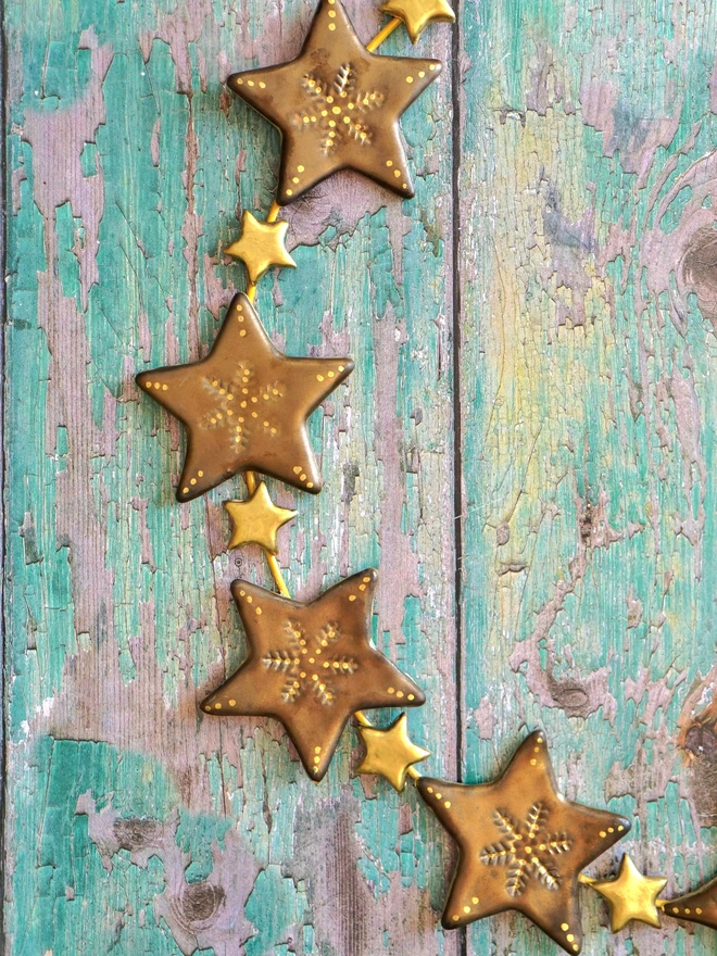 large ceramic christmas wreath, christmas star wreath, ceramic star wreath, gold star wreath, Christmas wreath, Jenny Hopps Pottery, Christmas decoration, christmas wall hanging