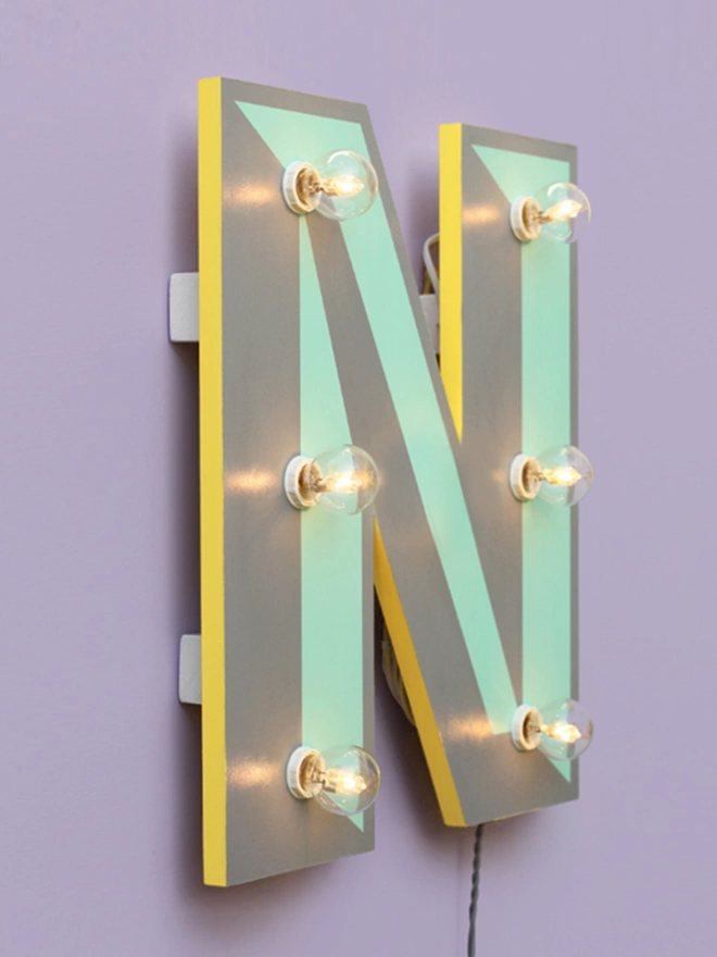 Custom letter wall light letter N with yellow edges