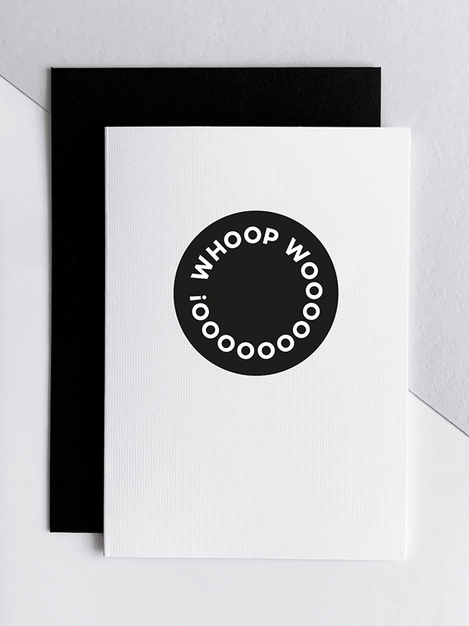 Black and white card with circle and the words Whoop Wooooooo!