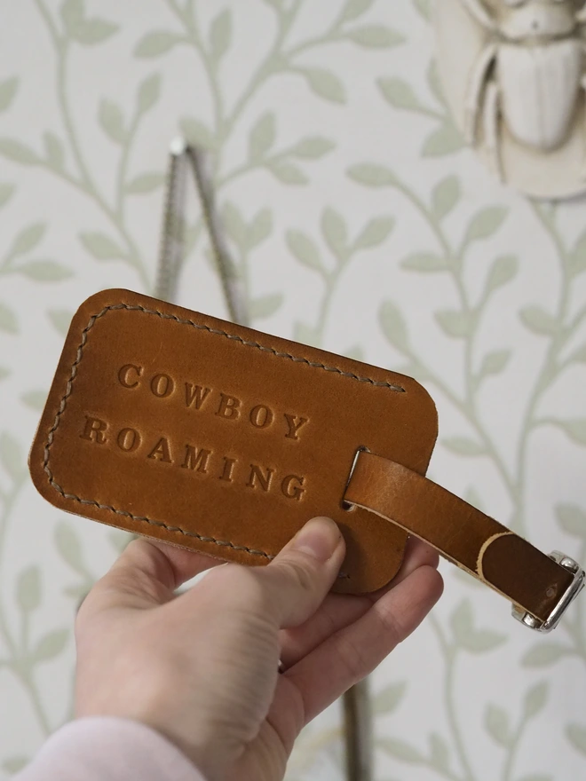 Personalised leather luggage tag. Handmade leather travel tag in tan brown.