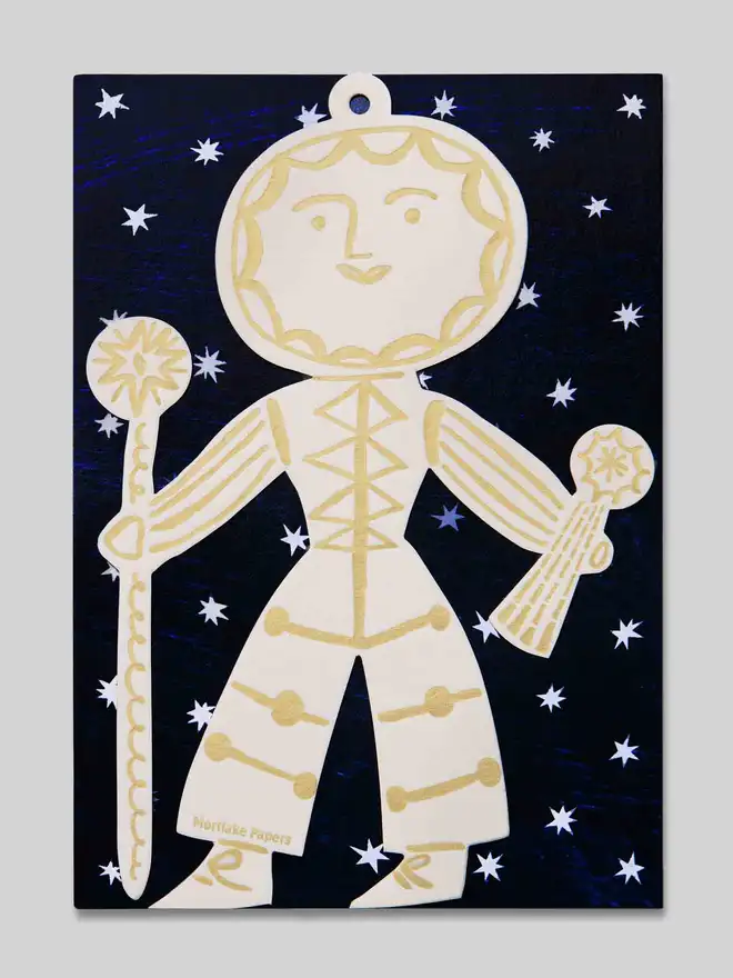 Letterpress Sun Folk Christmas tree ornament on celestial packaging