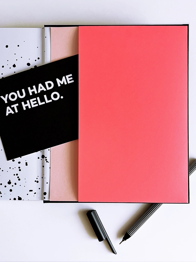 Planner Pocket in Neon Pink in the back of a planner