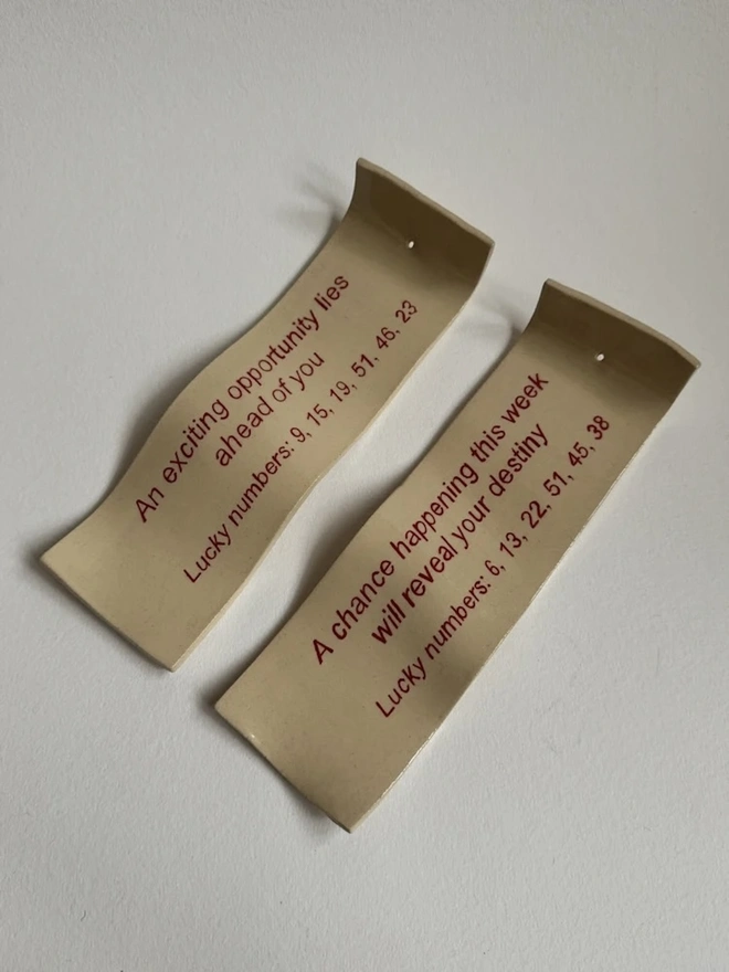 Fortune Incense Holder, a pair of incense holders sitting on a plain white surface. 