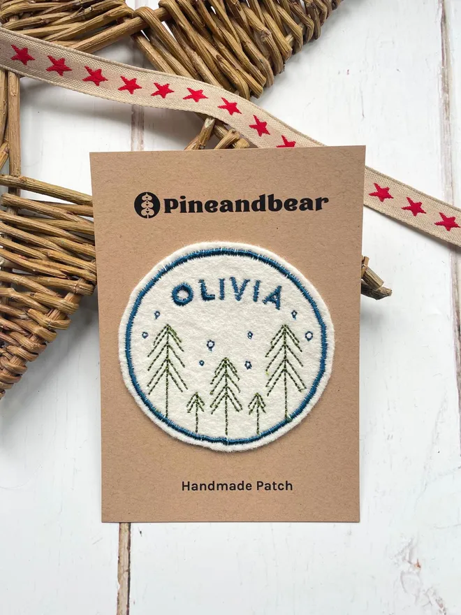 Personalised name patch with a fir trees design