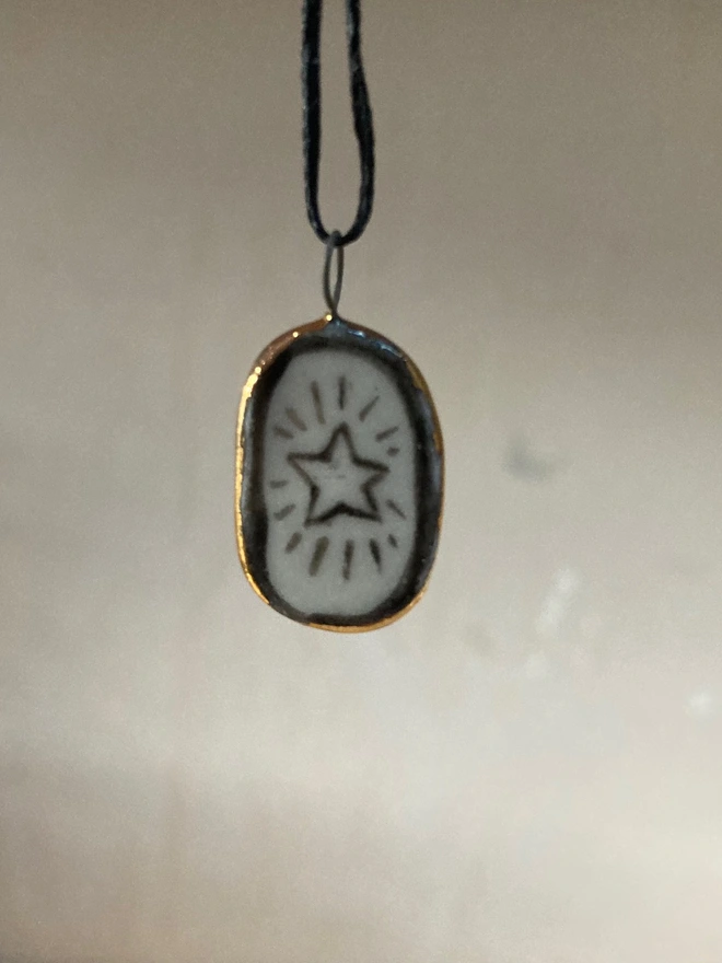 star pendant porcelain front