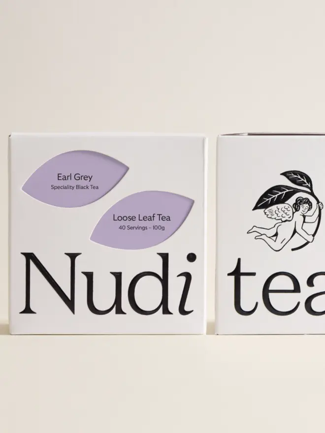 white box of tea with black and purple design