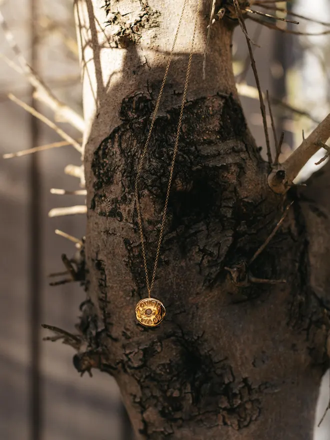 Touch wood necklace