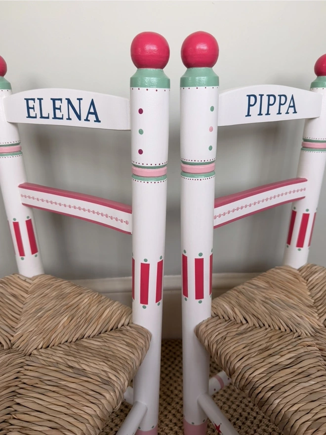 Hand painted Childs wooden rush chair. Personalised with Pippa and Elena. 