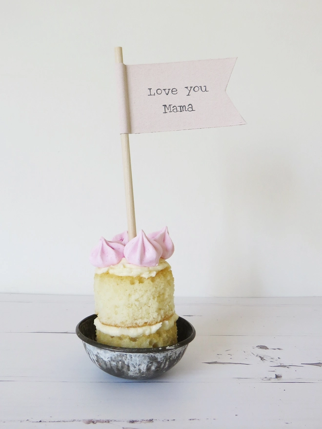 pink cotton painted flag cake topper