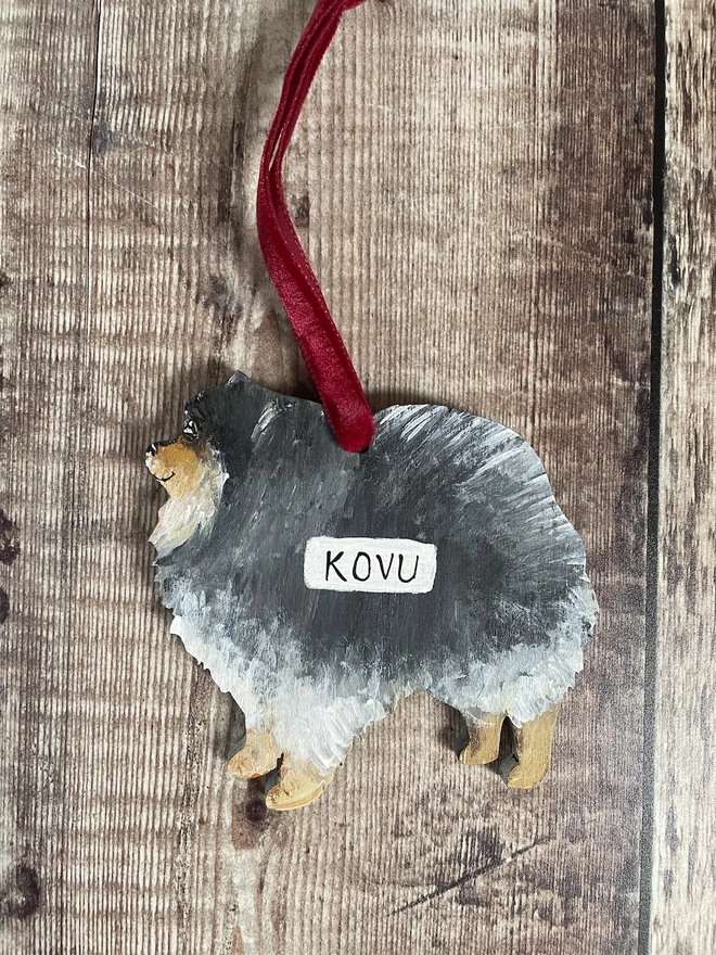 Pomeranian Hand - Painted Dog Christmas Decoration with red velvet ribbon