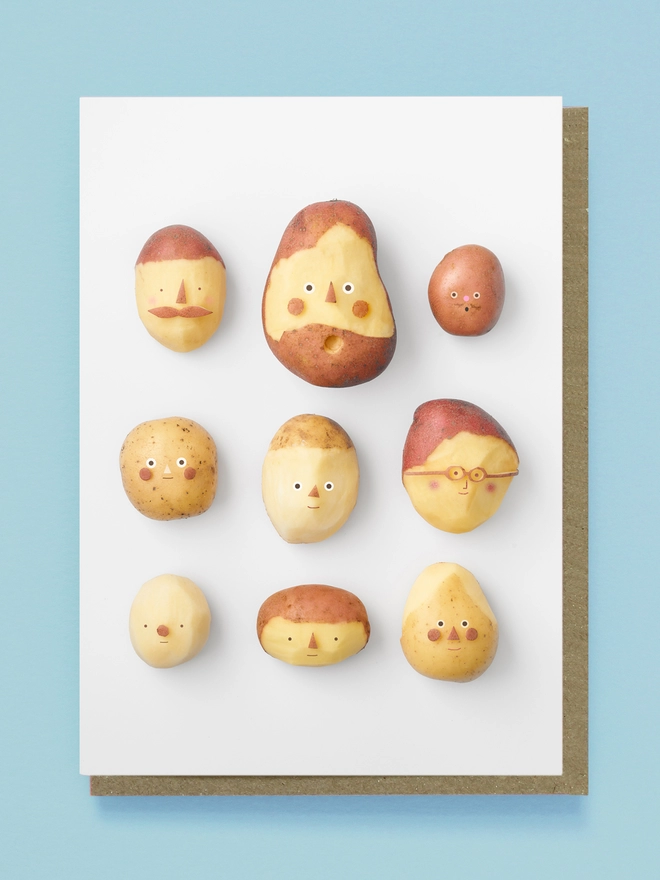 9 Different Peeled Potatoes with faces on a white background