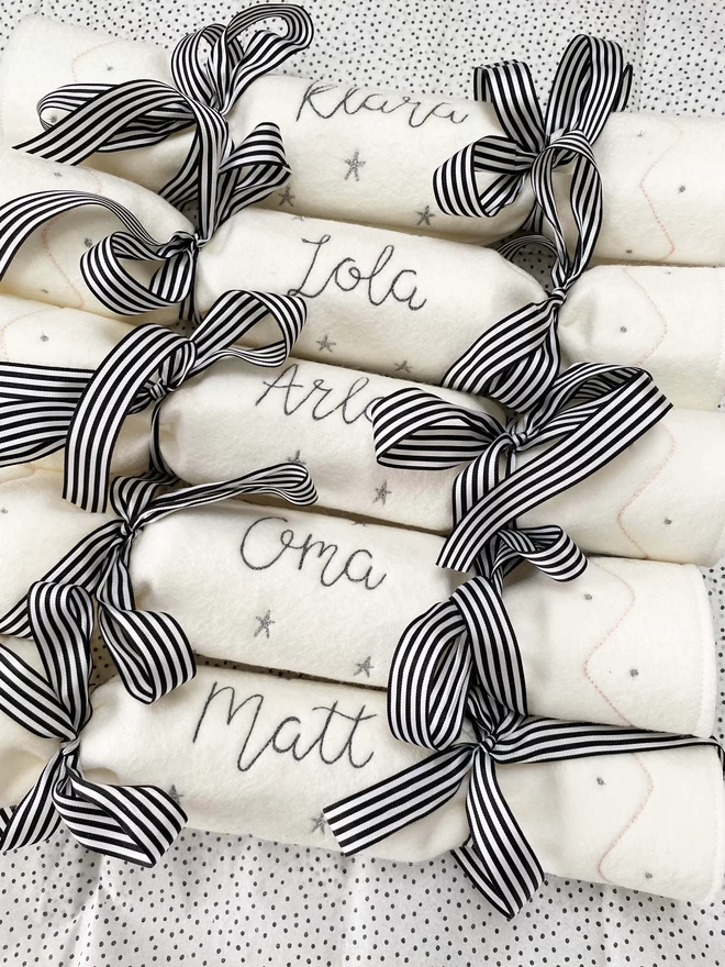 Personalised Christmas Crackers on wrapping tissue