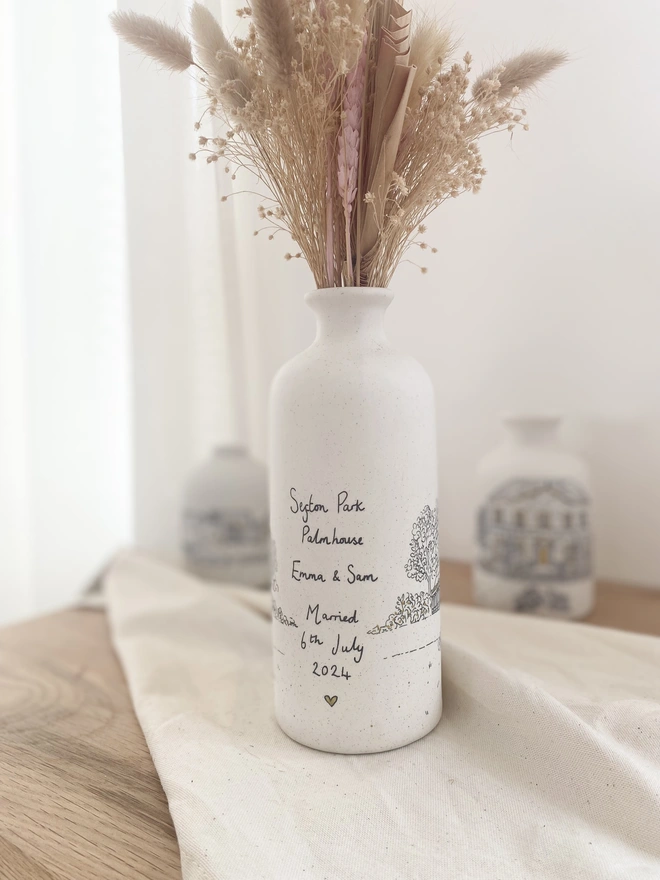 Ceramic vase with black hand written personalisation 